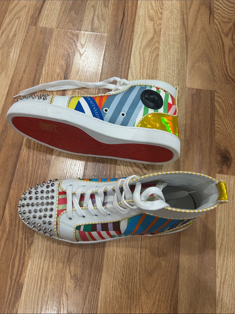 Christian Louboutin men high top spikes sneakers red bottom . Size 44 or 11